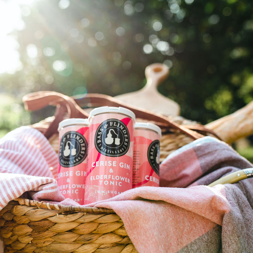 Bass & Flinders Distillery Cerise Gin and Elderflower tonic premixed G&T cans in picnic basket