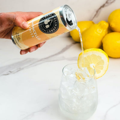 Bass & Flinders Distillery Limoncello Spritz premixed can pouring into G&T glass